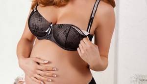 Почему появляются выделения из груди при беременности